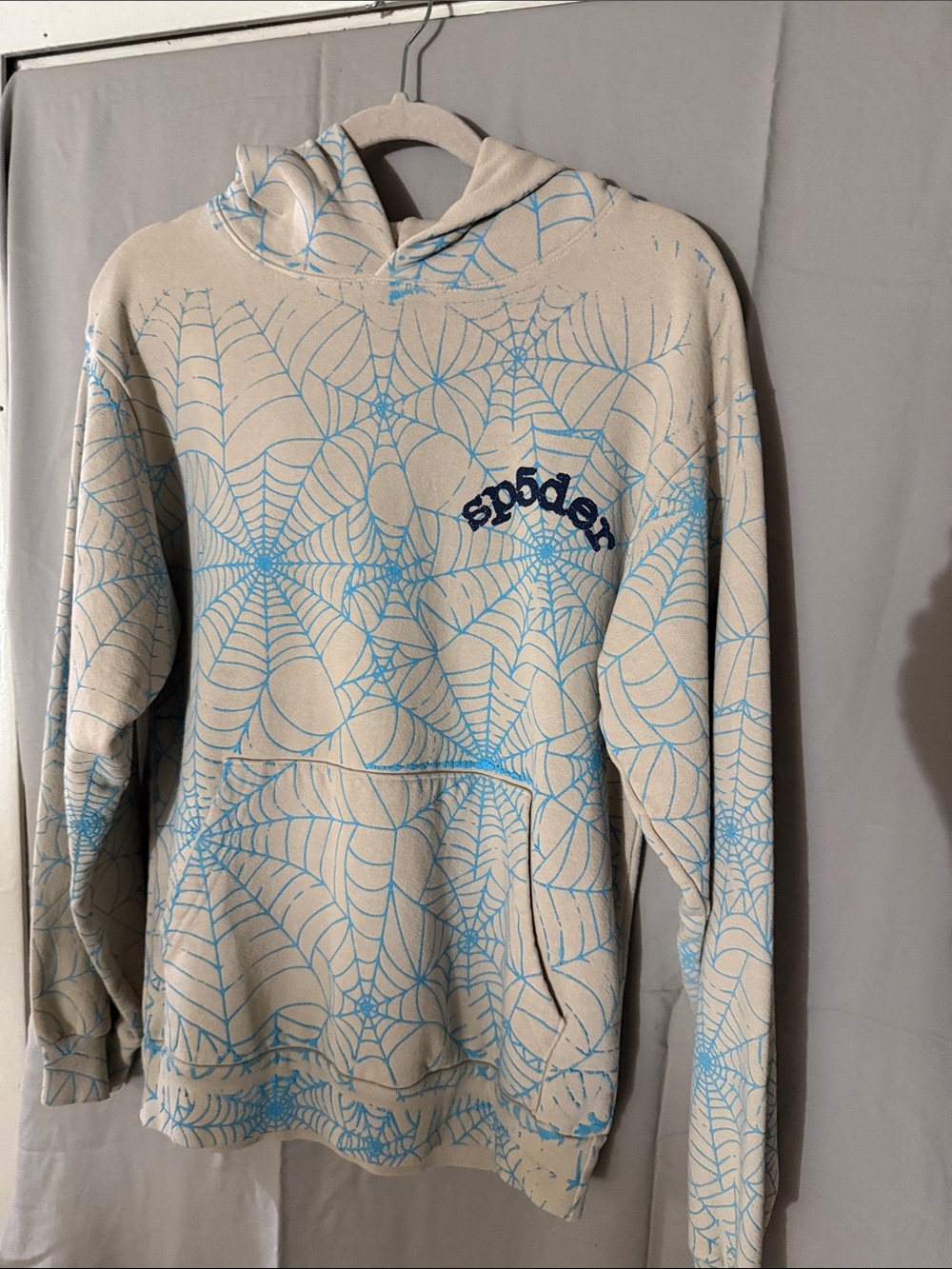 SP5DER  Hoodie with Light Blue Spiderweb Print